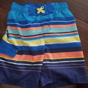 Cat& Jack swimming shorts size 6/7 in blue , orange and yellow